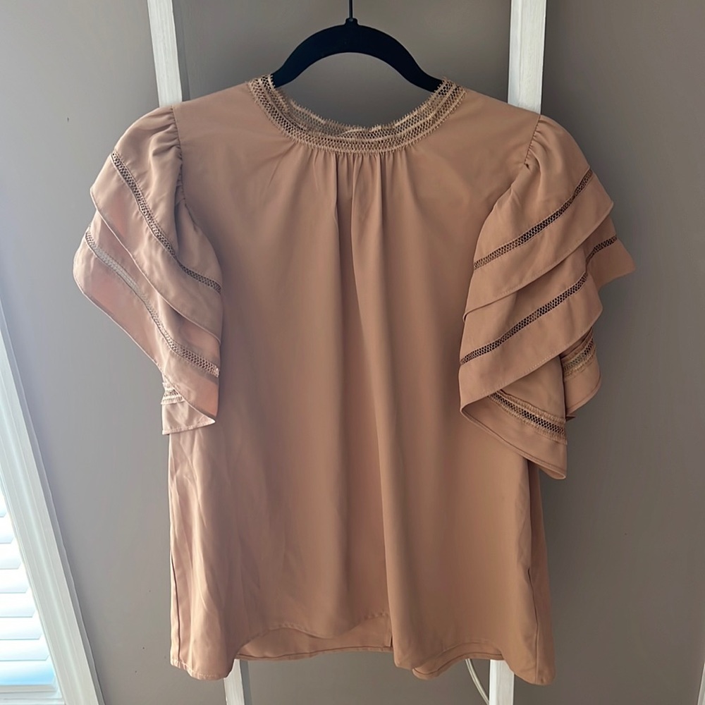 Perfect blouse for the office or a night out!